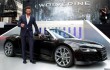 Hugh Jackman arrives at The Wolverine premiere in Audi R8