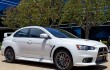 LIVE Mitsubishi unveils Lancer Evolution Final Edition