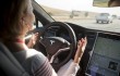 Tesla's autopilot lets cars drive, change lanes themselves