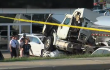 Cops Trucker choking on soda destroys new cars