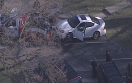 Report: Man found dead in car in Ferguson, Mo.