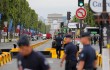 Paris police shoot at car at Tour de France finish