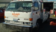 Isuzu NPR rollback wrecker